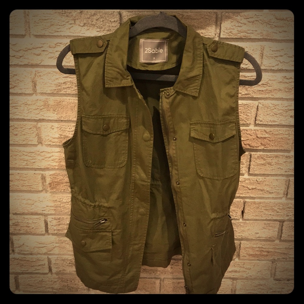 Never worn, NWOT small army green vest. Adorable!